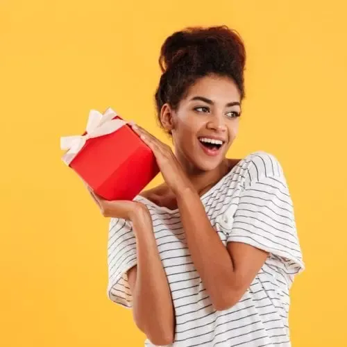 Woman holding gift box