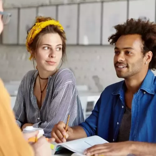 People sitting together at table