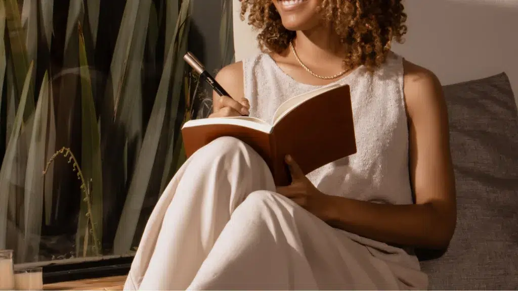 Woman with a cannabis consumption journal