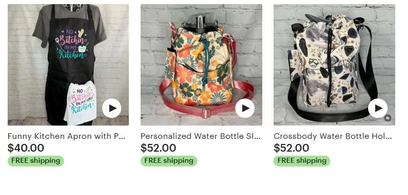 Three products: a black kitchen apron with colorful text, a floral water bottle sling bag with a red strap, and a crossbody water bottle holder with a watercolor-style design.