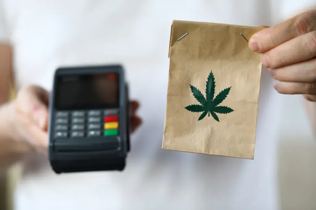 CT medical marijuana purchase with POS and bag with leaf
