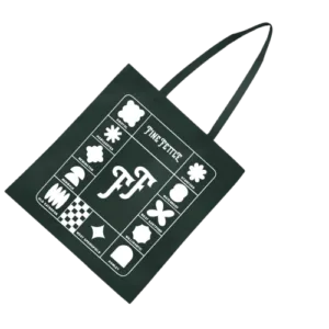 Black tote bag with white geometric shapes and the words FINE PETITE printed in the center.