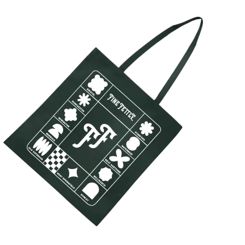 Black tote bag with white geometric shapes and the words FINE PETITE printed in the center.